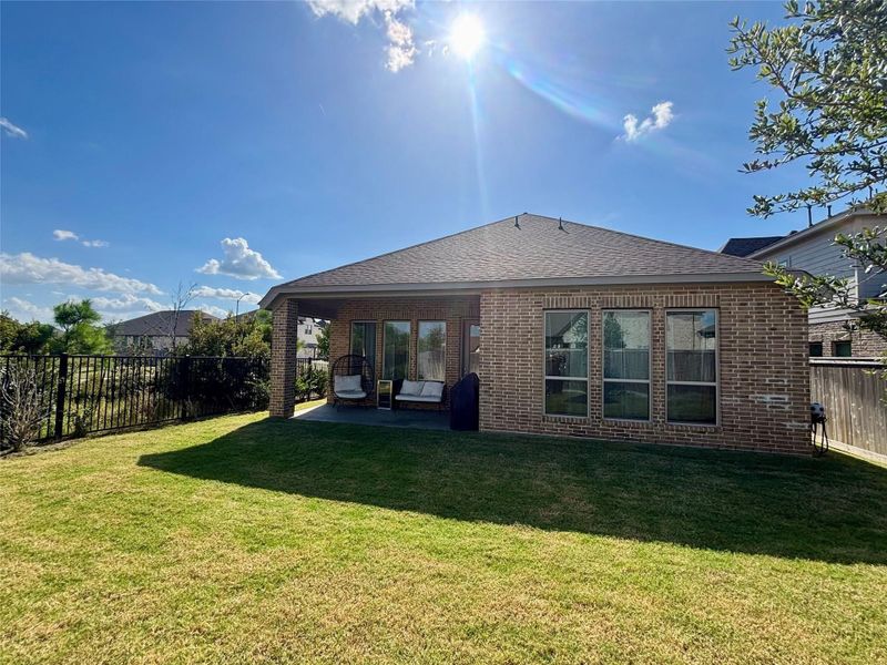 Exterior details and patio area of a home in Bridgeland 45', Cypress (Image 4).