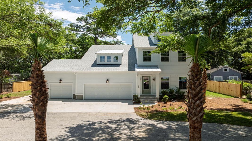 Front exterior of a new home in Bayview Acres, Mount Pleasant, SC, highlighting curb appeal (Image 24). Front exterior of a new home in Bayview Acres, Mount Pleasant, SC, highlighting curb appeal (Image 24).