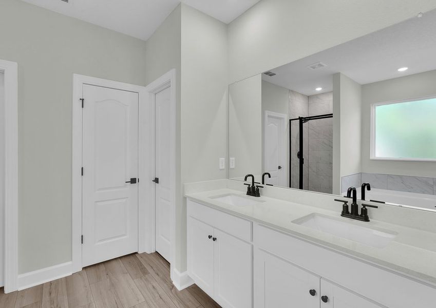 Get ready for your day in the master bathroom