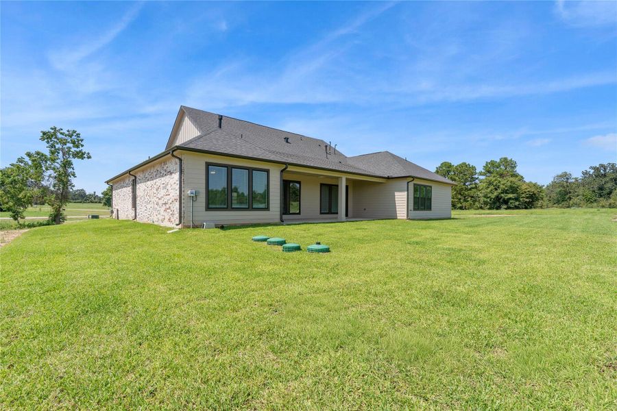 Exterior details and patio area of a home in Chapel Bend, Montgomery (Image 26). Exterior details and patio area of a home in Chapel Bend, Montgomery (Image 26).
