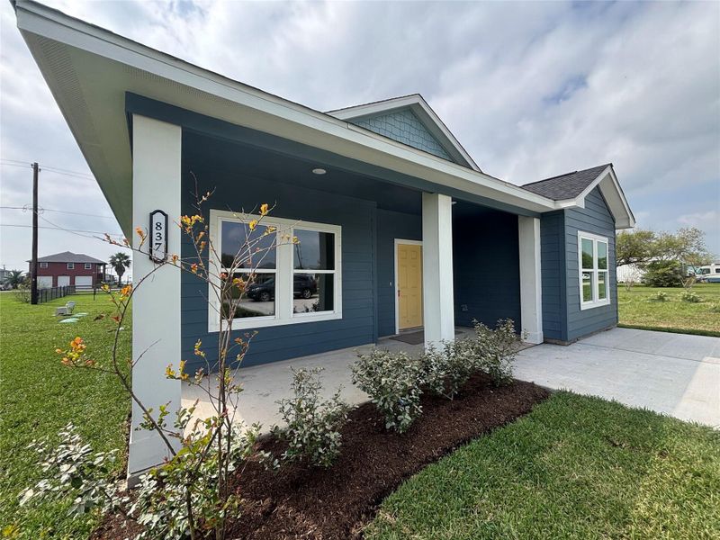 Front exterior of a new home in , Palacios, TX, highlighting curb appeal (Image 21). Front exterior of a new home in , Palacios, TX, highlighting curb appeal (Image 21).