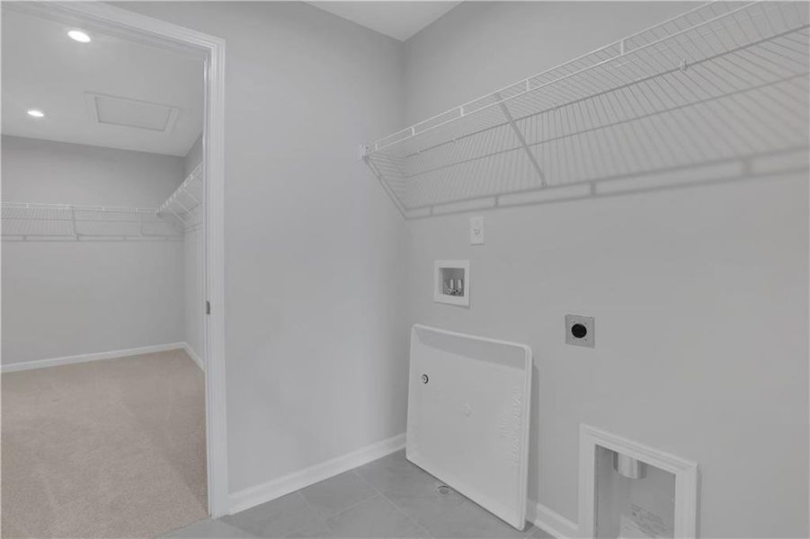 Spacious, unfurnished interior of a new home in The Paddocks at Doc Hughes, Buford (Image 44).
