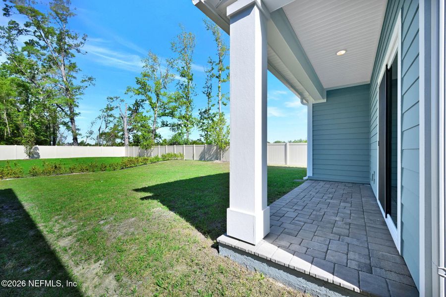 Exterior details and patio area of a home in Baxley Villas, Middleburg (Image 20).