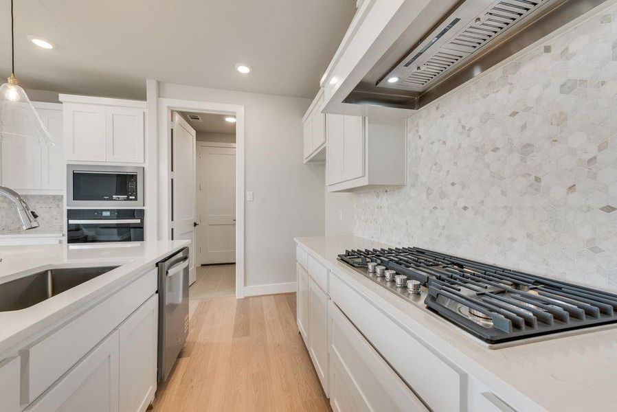 Furnished interior view inside a new home in Trails at Cottonwood Creek, Fate (Image 12).