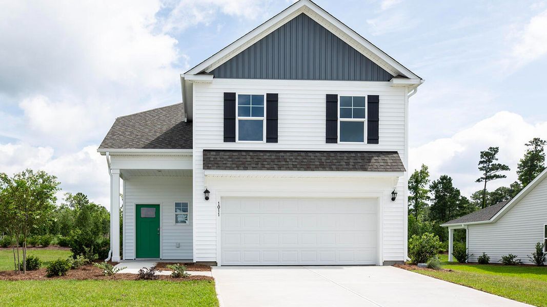 Front exterior of a new home in Cedar Hill Landing, Navassa, NC, highlighting curb appeal (Image 1).