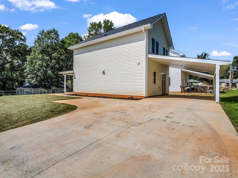 Front exterior of a new home in , Spindale, NC, highlighting curb appeal (Image 14).