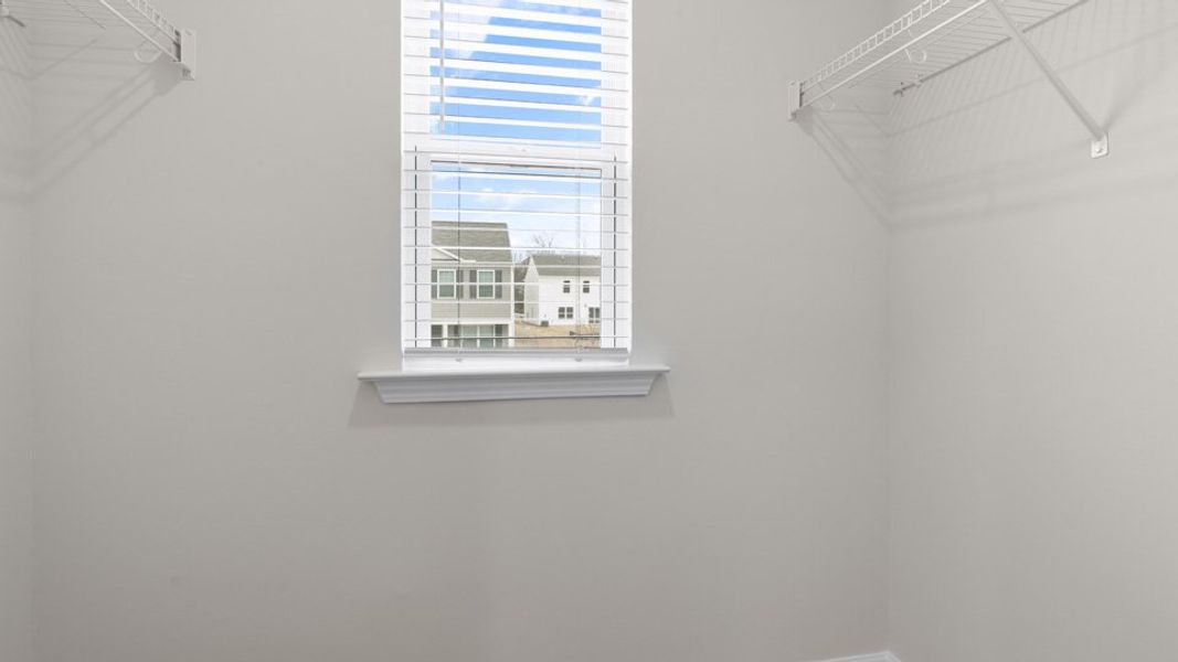Representative unfurnished interior of a home built from the HAYDEN by D.R. Horton in Wilson's Ridge, Wilson's Mills (Image 37).