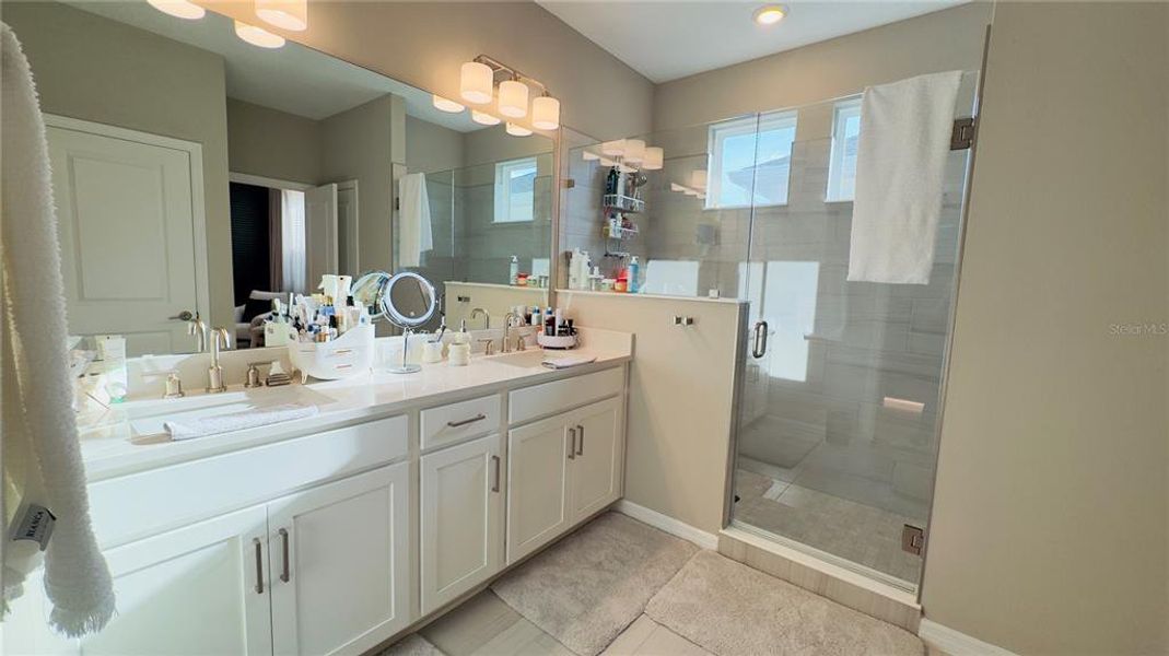 Furnished interior view inside a new home in Harvest at Ovation, Winter Garden (Image 37).