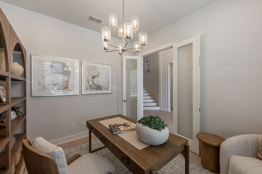 Representative furnished interior of a home built from the Woodbridge by Tri Pointe Homes in Bridgeland, Cypress (Image 7).