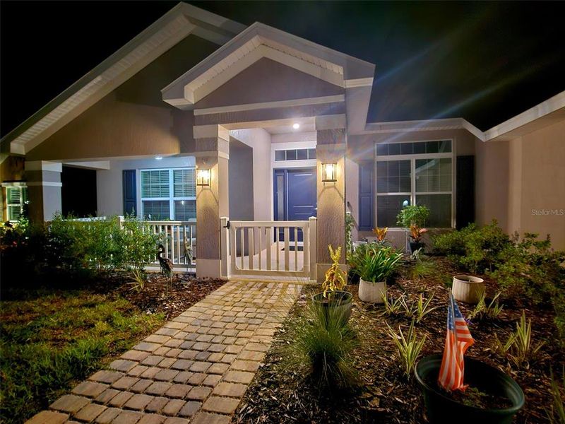 Front exterior of a new home in Juliette Falls, Dunnellon, FL, highlighting curb appeal (Image 24).