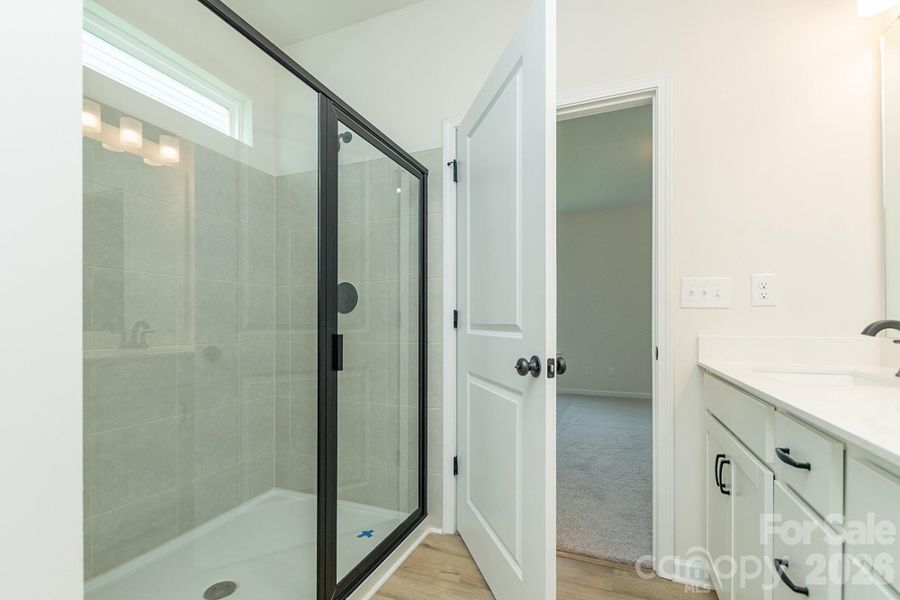 Furnished interior view inside a new home in Country Club Village, Salisbury (Image 12).