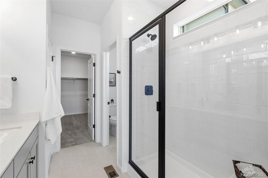 Furnished interior view inside a new home in The Cottages Collection at Ridgeline Vista, Brighton (Image 15).