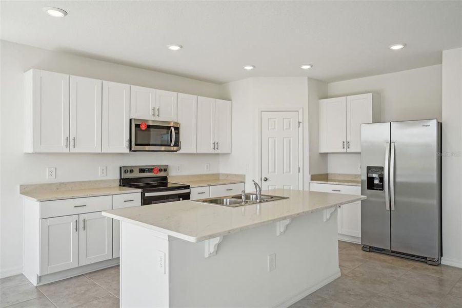 Furnished interior view inside a new home in Lake Deer Estates - Signature Series, Poinciana (Image 12). Furnished interior view inside a new home in Lake Deer Estates - Signature Series, Poinciana (Image 12).