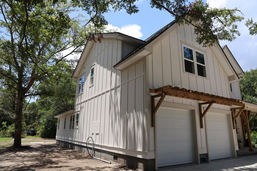 Front exterior of a new home in , Awendaw, SC, highlighting curb appeal (Image 20). Front exterior of a new home in , Awendaw, SC, highlighting curb appeal (Image 20).