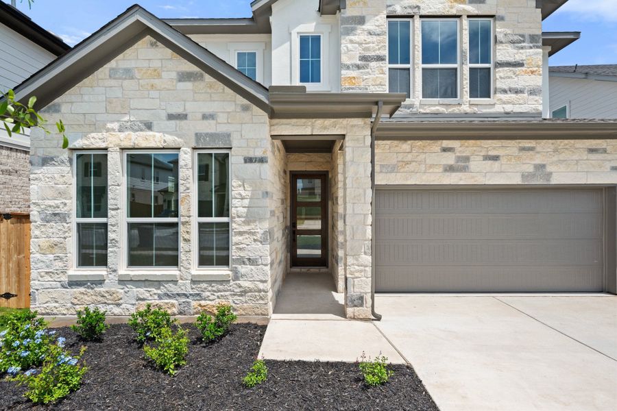 Exterior details and patio area of a home in Heritage, Dripping Springs (Image 3).