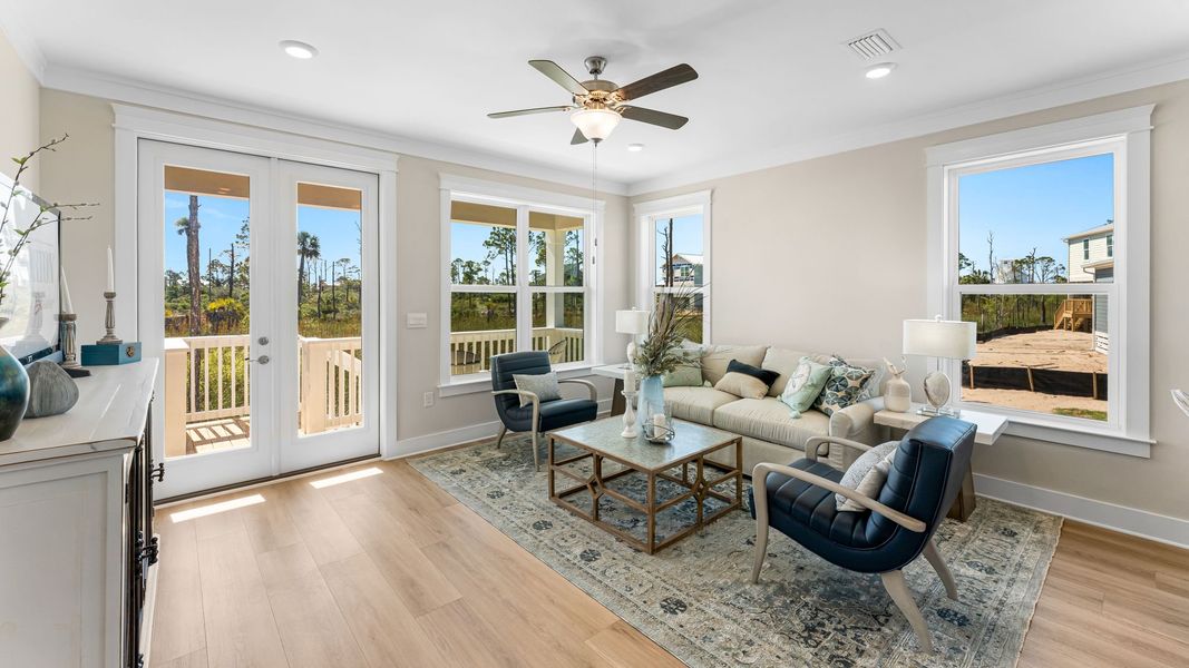 Representative furnished interior of a home built from the The Islamorada by D.R. Horton in WindMark Beach, Port Saint Joe (Image 12).