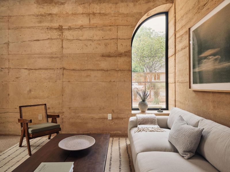 Rammed earth offers a sustainable alternative to conventionalbuilding materials. Locally sourced soils and aggregates minimizeenvironmental impact and the thermal mass of the thick wallsregulates interior temperatures, eliminating the need for additionalinsulation. The result is a structure where form and function meetin perfect harmony. Rammed earth offers a sustainable alternative to conventionalbuilding materials. Locally sourced soils and aggregates minimizeenvironmental impact and the thermal mass of the thick wallsregulates interior temperatures, eliminating the need for additionalinsulation. The result is a structure where form and function meetin perfect harmony.