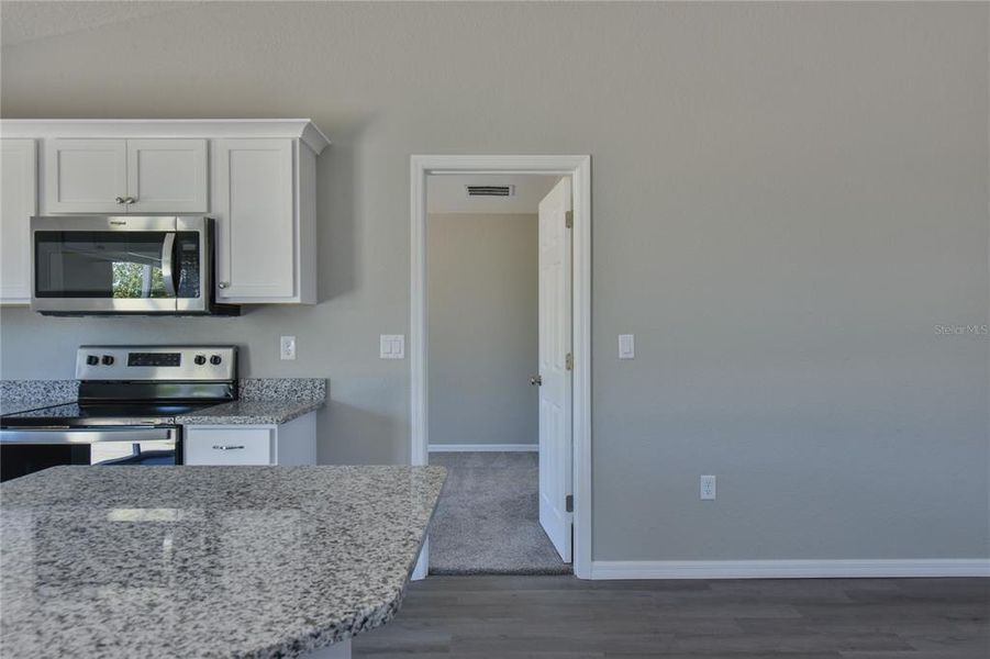 Furnished interior view inside a new home in , Dunnellon (Image 9).