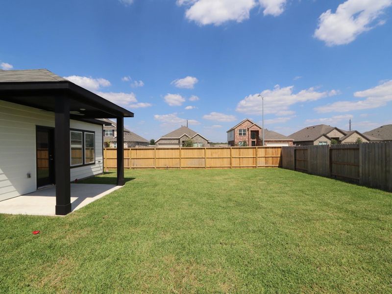 Exterior details and patio area of a home in Miller's Pond, Rosenberg (Image 3).