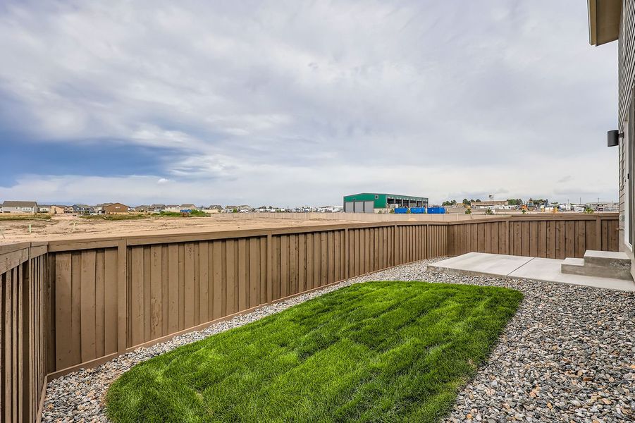 Front exterior of a new home in Sterling Ranch 40s, Colorado Springs, CO, highlighting curb appeal (Image 22).
