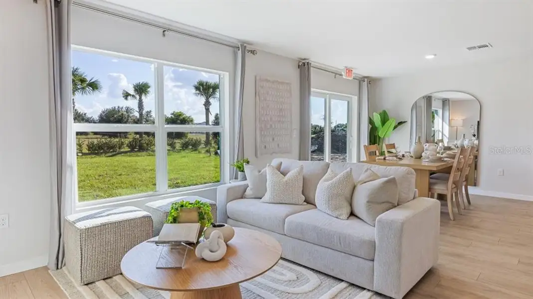 Furnished interior view inside a new home in Driftwood Bay, Port Charlotte (Image 4).