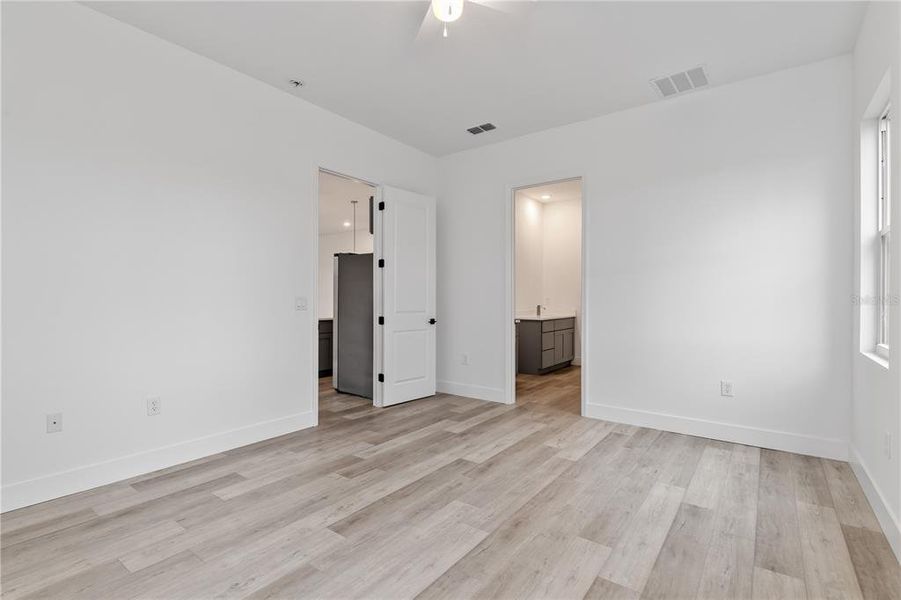 Spacious, unfurnished interior of a new home in , Port Charlotte (Image 34).