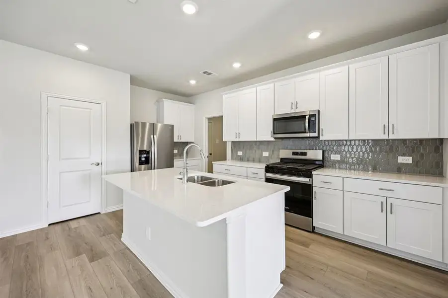 Photo is not of the actual home, but is an inspirational photo of builder’s model home and may depict options, furnishings, and/or decorator features that are not included.