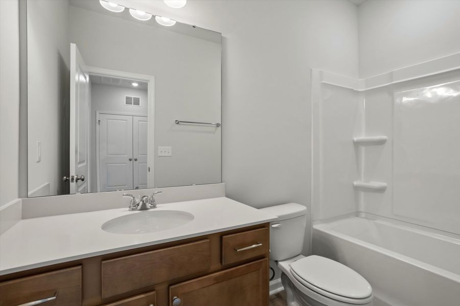 Furnished interior view inside a new home in West Main Townhomes, Sanford (Image 12).