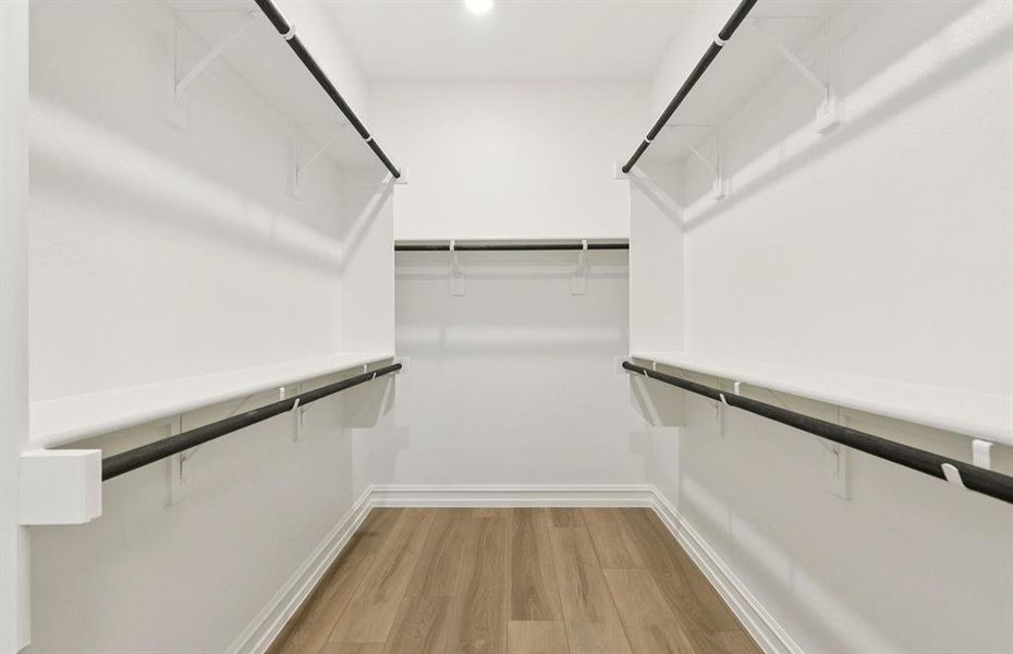 Oversized owner's suite showcases with ample closet space