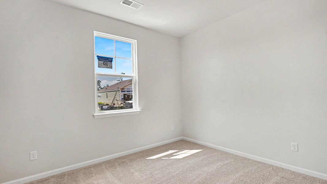 Spacious, unfurnished interior of a new home in The Meadows at Wildwood Village, Shallotte (Image 10).