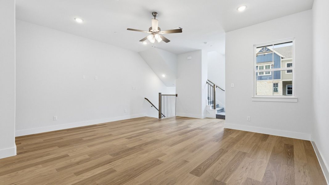 Furnished interior view inside a new home in Collin Creek, Plano (Image 17).