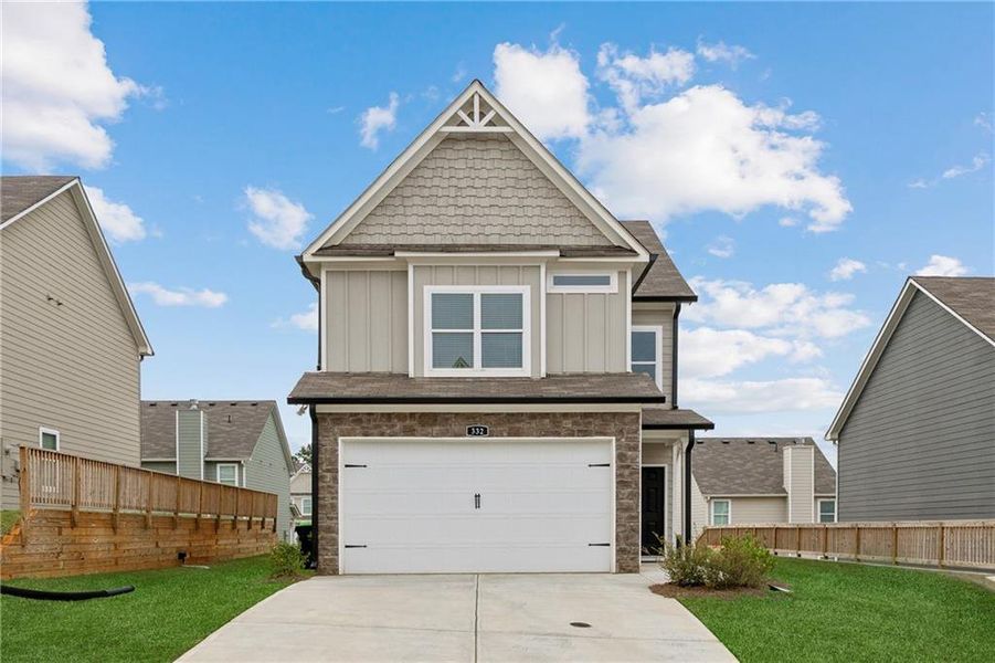 Front exterior of a new home in , Cartersville, GA, highlighting curb appeal (Image 2).
