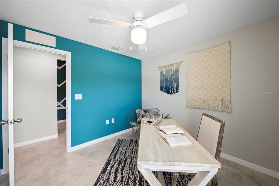 Furnished interior in a model home at Rotonda Lakes in Port Charlotte (Image 16).