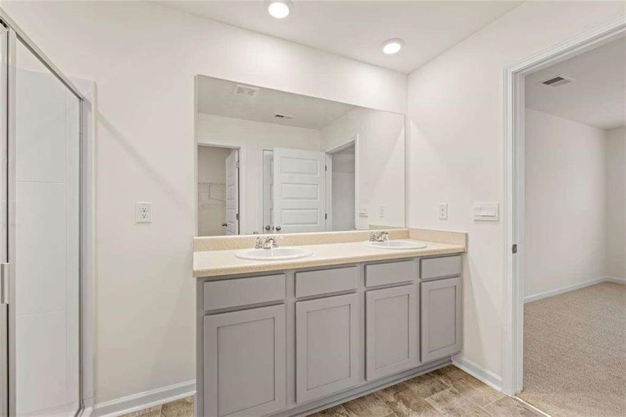 Furnished interior view inside a new home in Oakchase at Hampton, Hampton (Image 46).