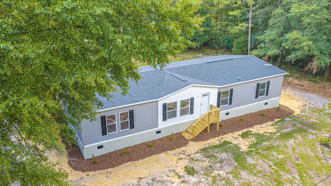 Exterior details and patio area of a home in , Walterboro (Image 32).