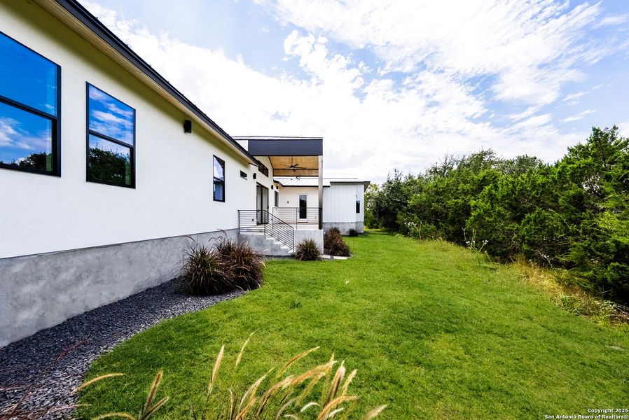 Front exterior of a new home in , San Antonio, TX, highlighting curb appeal (Image 24). Front exterior of a new home in , San Antonio, TX, highlighting curb appeal (Image 24).