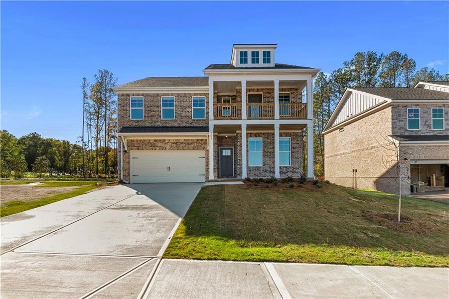 Front exterior of a new home in Bowers Farm, McDonough, GA, highlighting curb appeal (Image 13).