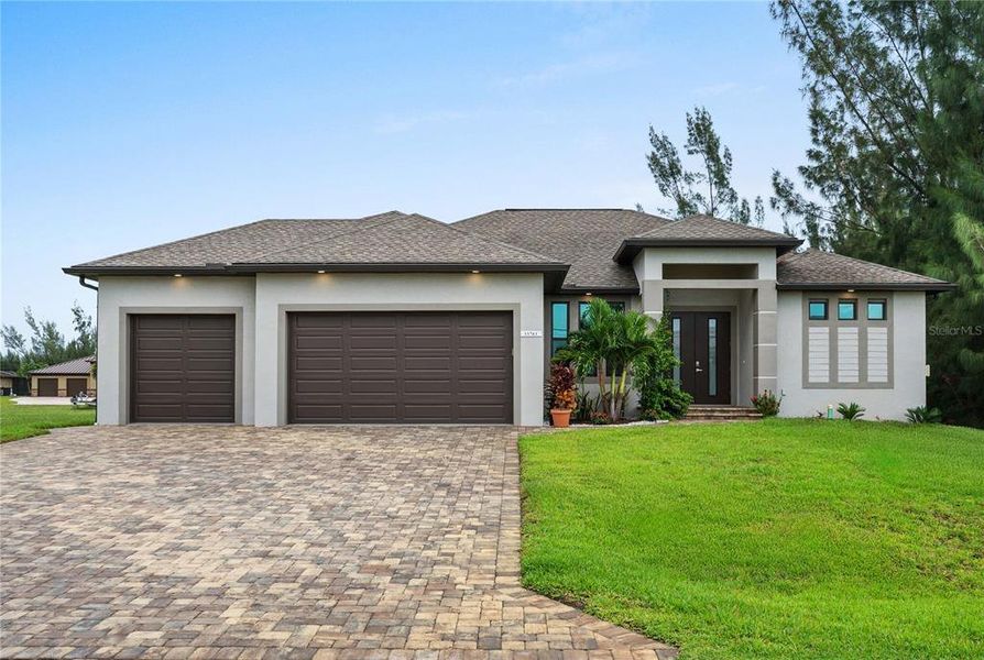Front exterior of a new home in , Port Charlotte, FL, highlighting curb appeal (Image 28). Front exterior of a new home in , Port Charlotte, FL, highlighting curb appeal (Image 28).