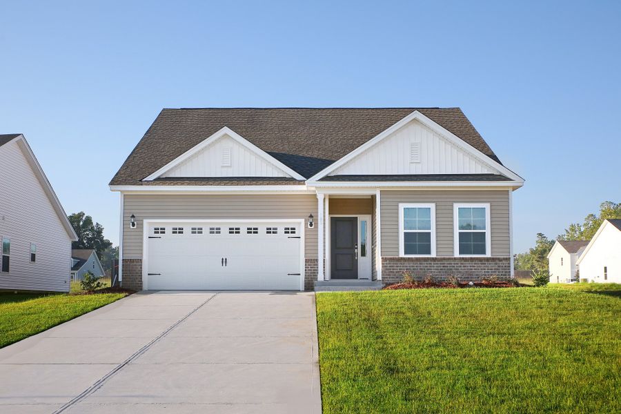 Front exterior of a new home in Jordan Grove, Conway, SC, highlighting curb appeal (Image 1). Front exterior of a new home in Jordan Grove, Conway, SC, highlighting curb appeal (Image 1).