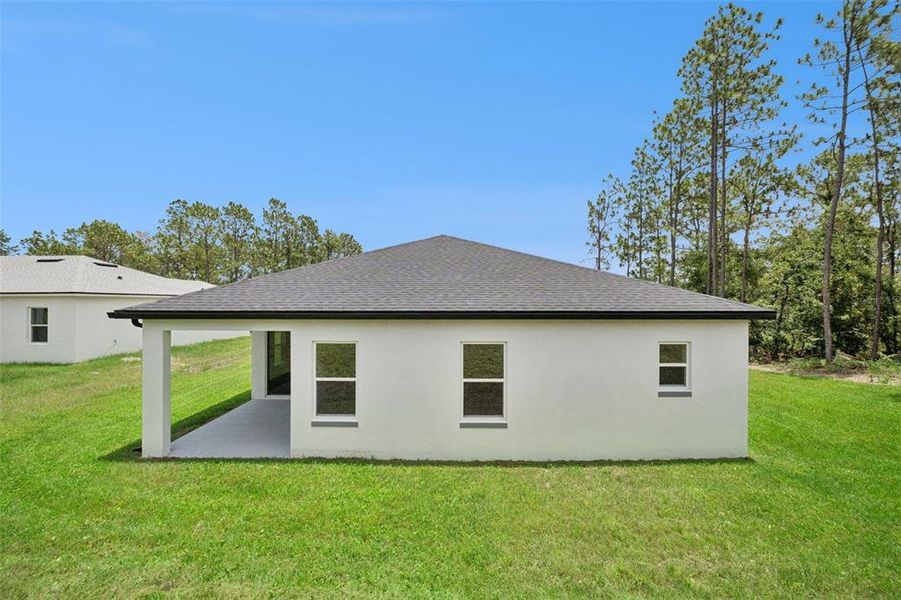 Exterior details and patio area of a home in , Ocala (Image 3).