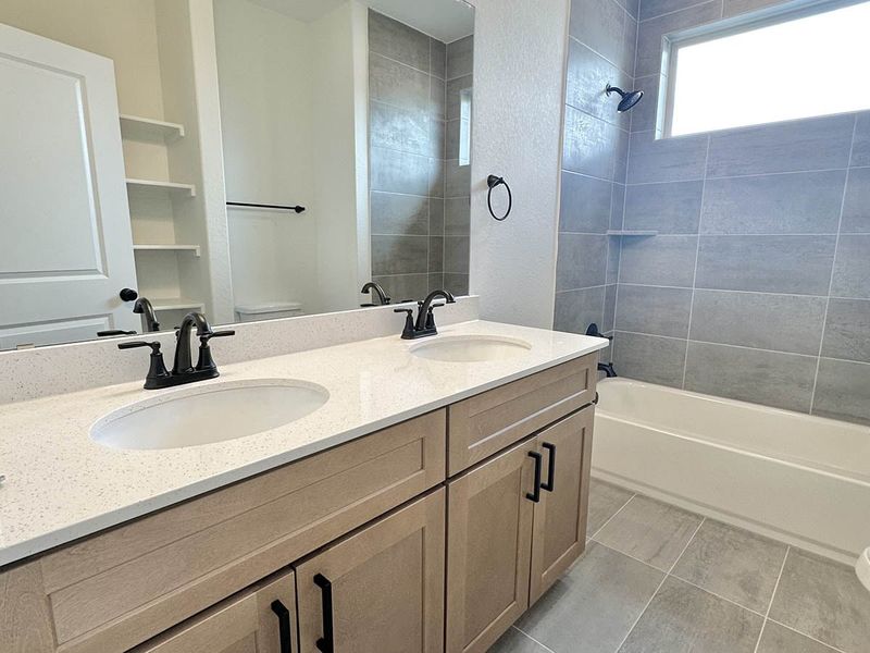 Furnished interior view inside a new home in Sage Hollow, Kyle (Image 17).