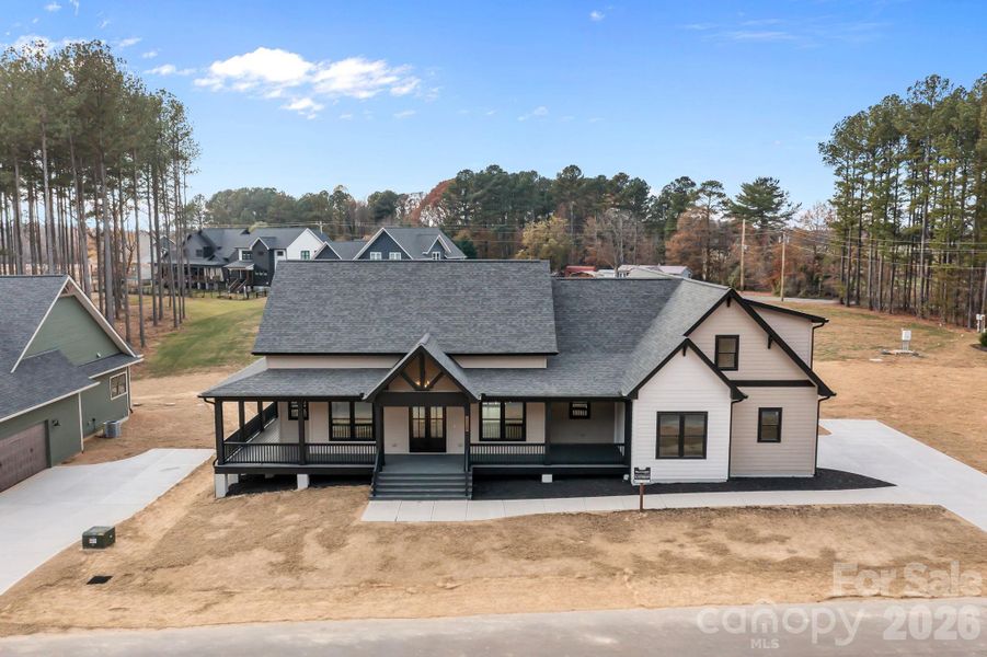 Front exterior of a new home in , Statesville, NC, highlighting curb appeal (Image 24).