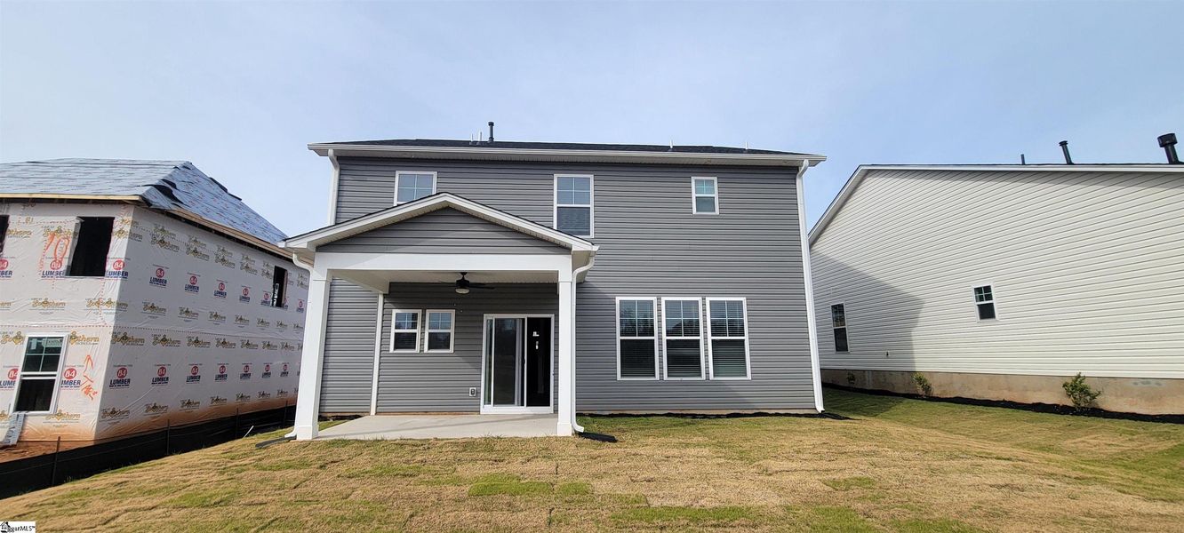Exterior details and patio area of a home in Halton Oaks, Spartanburg (Image 19).