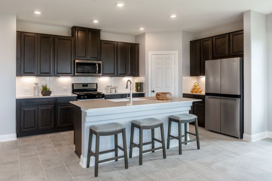 Representative furnished interior of a home built from the 2858 by KB Home in Salerno - Hallmark Collection, Round Rock (Image 6).