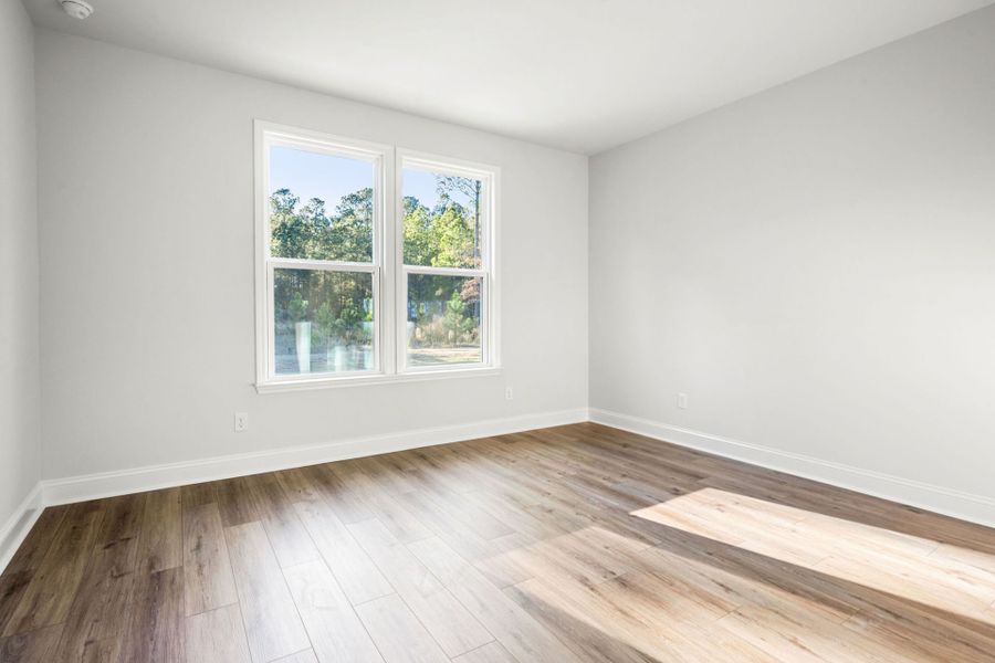 Spacious, unfurnished interior of a new home in Sun City Hilton Head, Bluffton (Image 17).