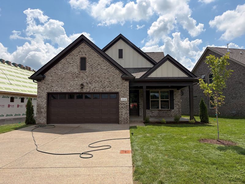 Front exterior of a new home in Bluebird Hollow at Autumn Ridge, Spring Hill, TN, highlighting curb appeal (Image 13).