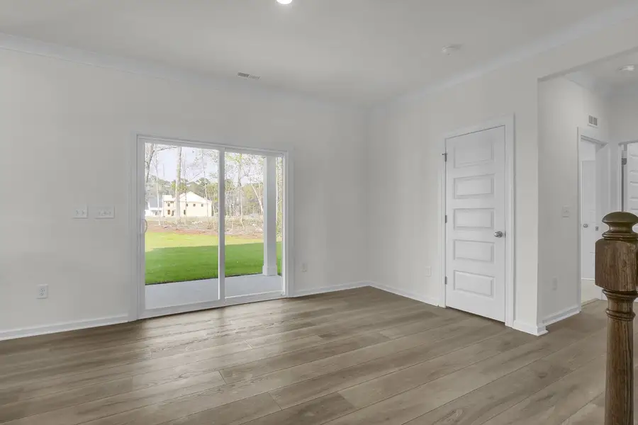 Spacious, unfurnished interior of a new home in Indigo at Abbey Preserve, Wilmington (Image 14).