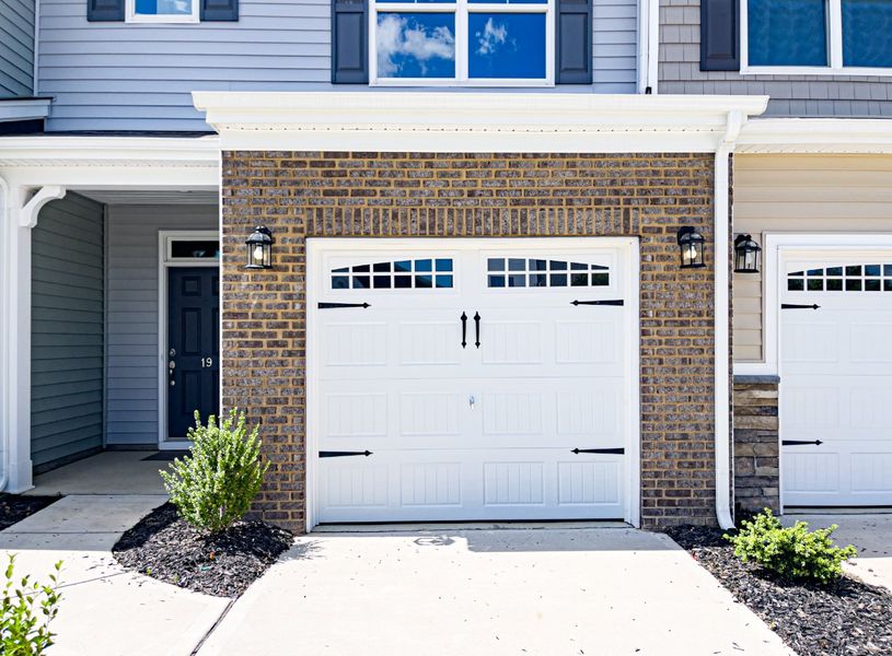 Front exterior of a new home in Fairview Village Townhomes, Simpsonville, SC, highlighting curb appeal (Image 17).
