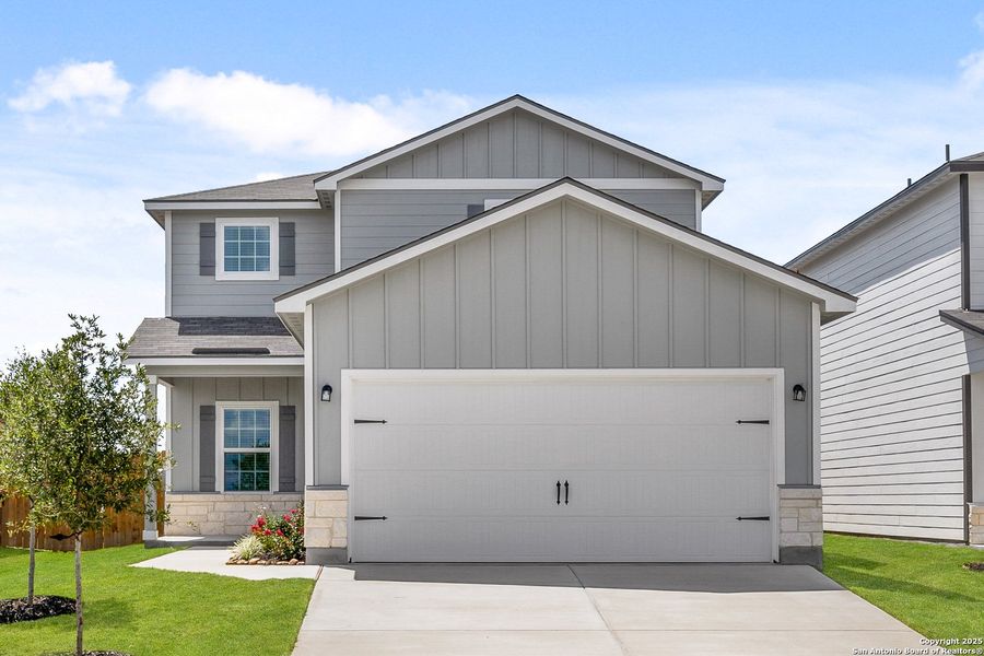 Front exterior of a new home in Blue Wing, San Antonio, TX, highlighting curb appeal (Image 1). Front exterior of a new home in Blue Wing, San Antonio, TX, highlighting curb appeal (Image 1).