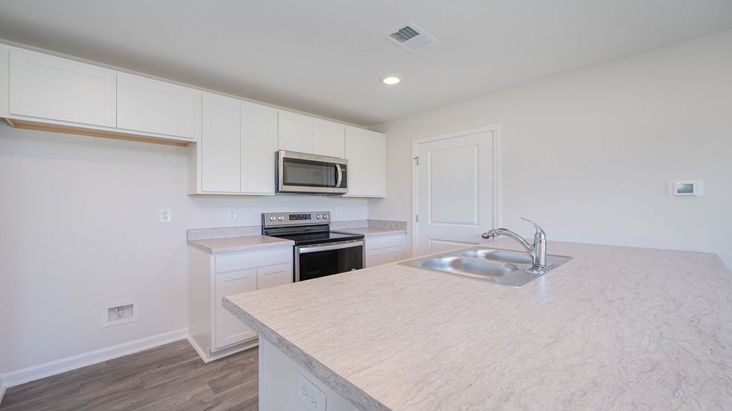 Furnished interior view inside a new home in Cottonwood Place, Tabor City (Image 3).